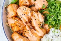 Spicy Salmon Rice Bowl with Avocado and Sriracha Drizzle
