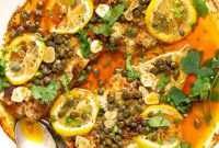 Mediterranean Baked Fish with Tomatoes, Olives, and Herbs