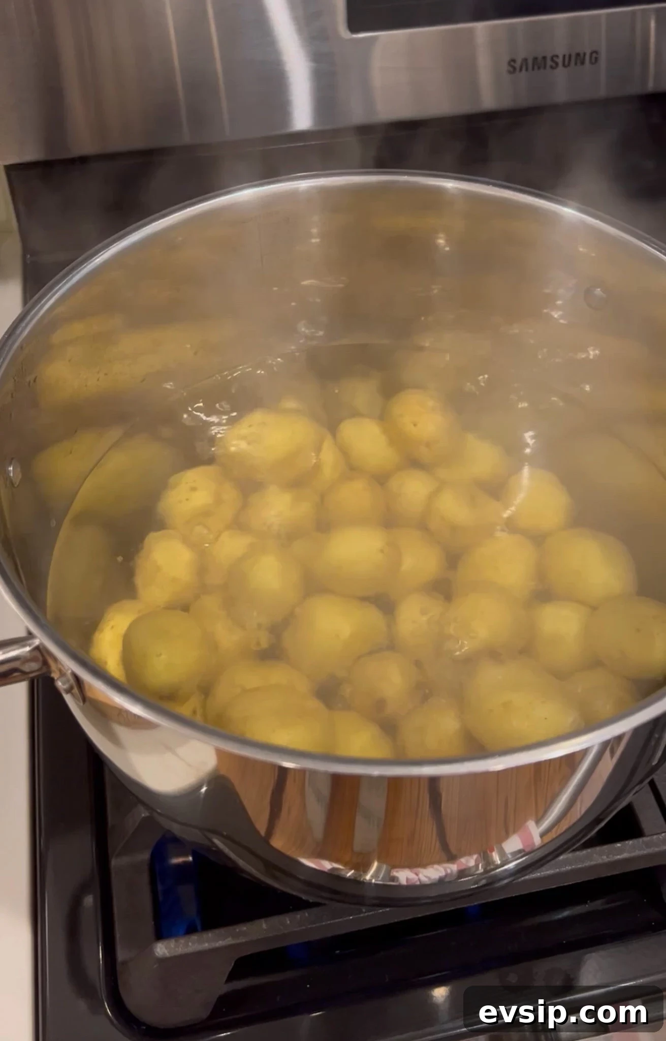 Boiling potatoes on the stove.