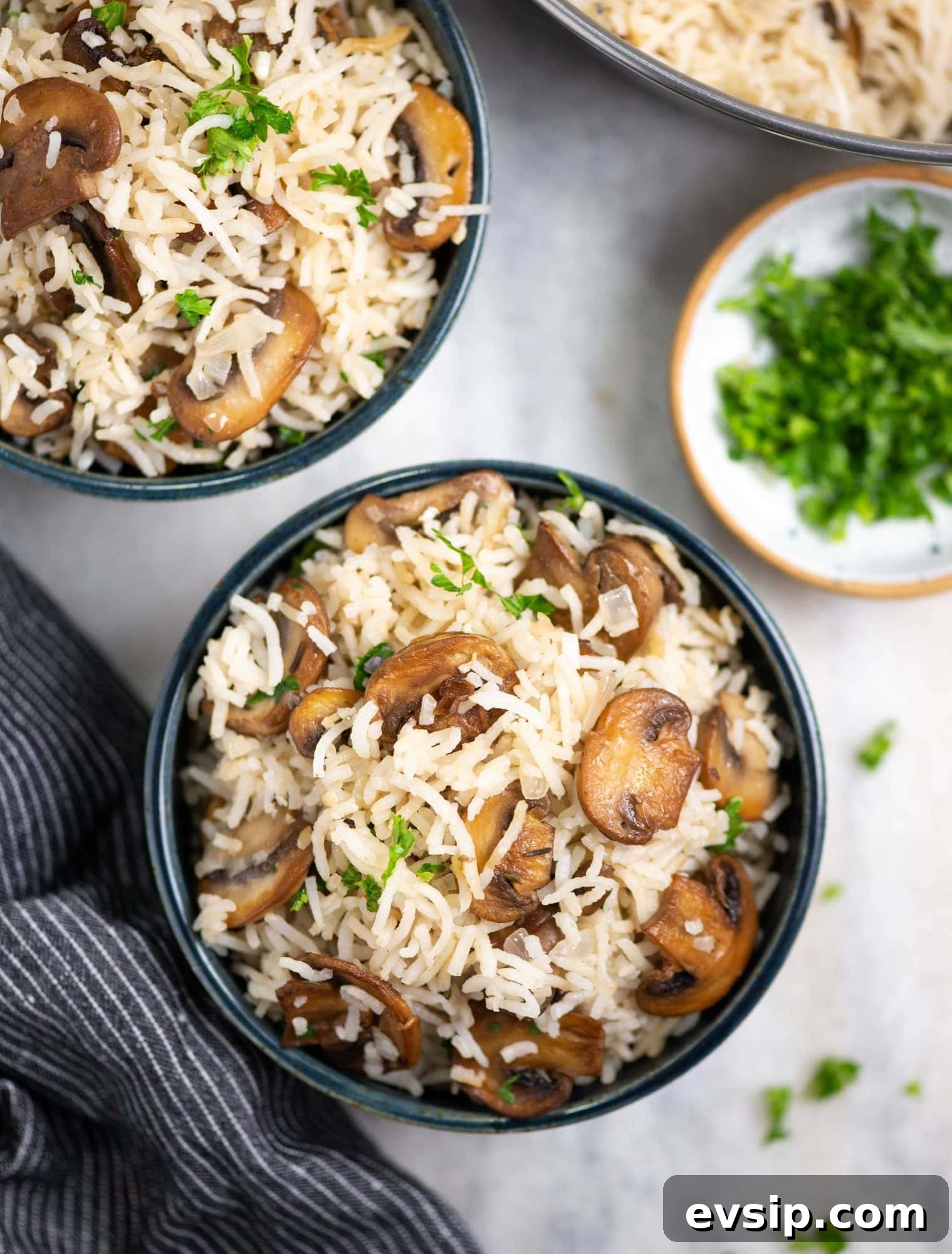 Mushroom rice or pulao or pulav serve in a bowl as a whole meal.