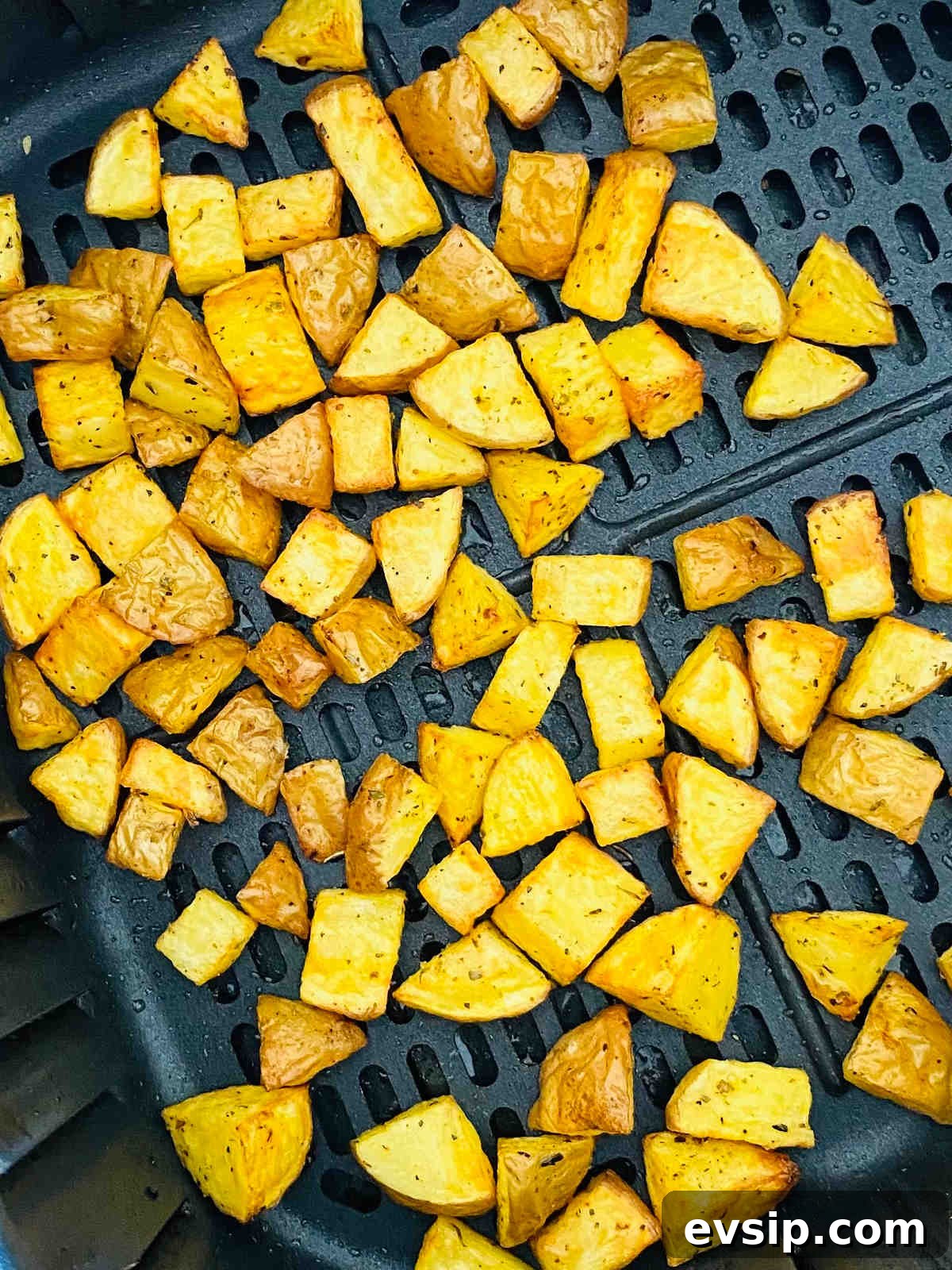 Crispy Air Fryer Diced Potatoes You’ll Love 5 cubed potatoes in air fryer basket