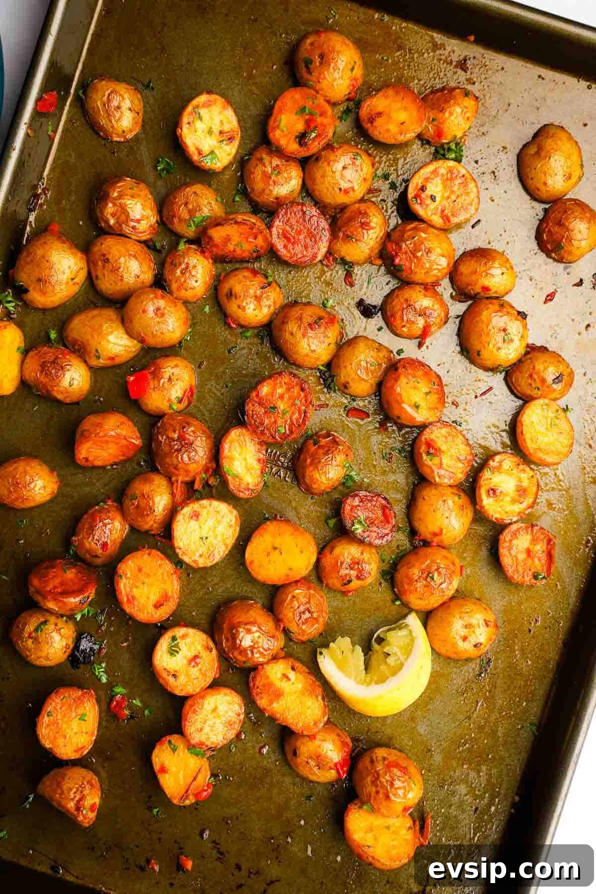 harissa potatoes on a baking sheet