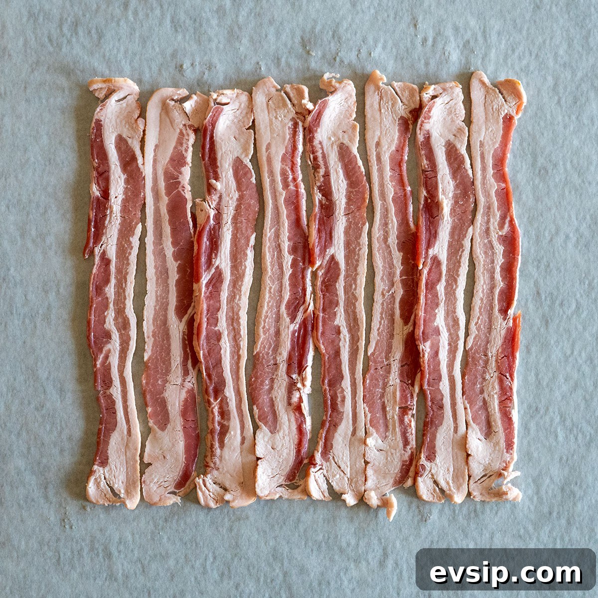 8 bacon slices side by side.