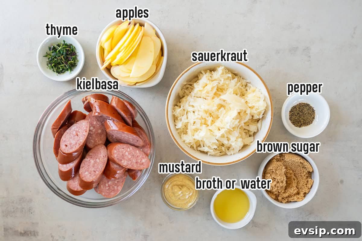 Sliced kielbasa, sauerkraut, apples, and other ingredients in bowls with text overlay.