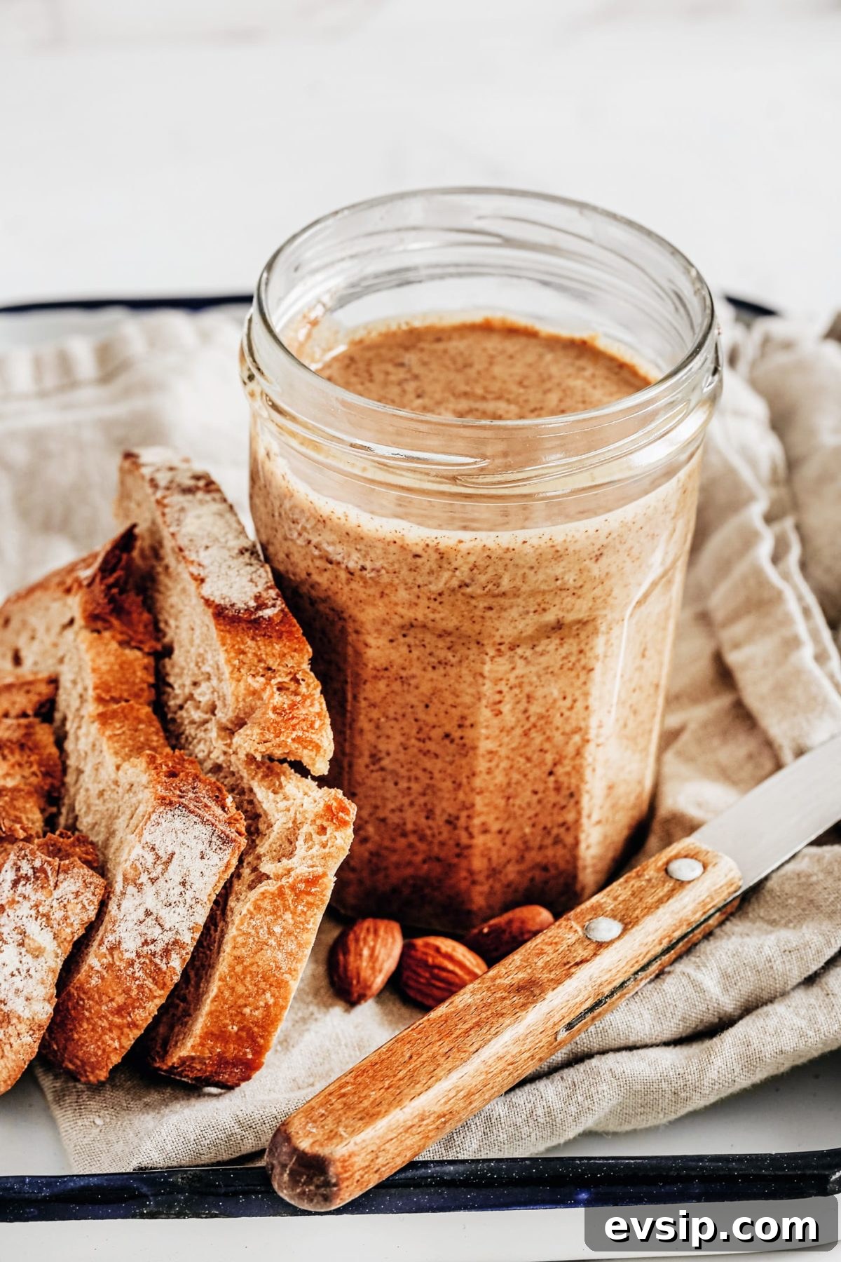 almond butter on a plate with bread