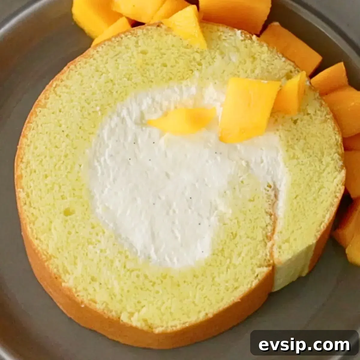 moist and fluffy roll cake with fresh mango