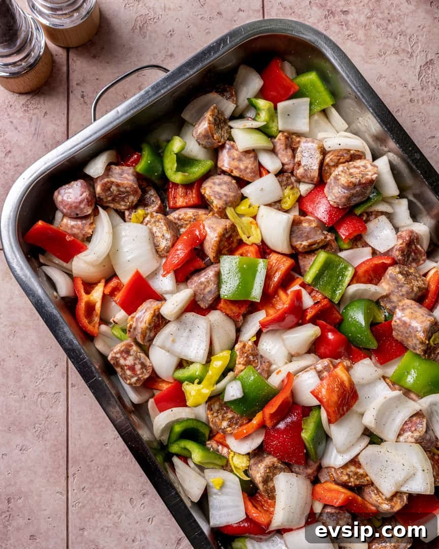 Oven-Roasted Italian Sausage and Peppers with Garlic and Herbs 3 Italian Sausage and Peppers Step 2: Add all ingredients to a large roasting pan.