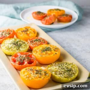 Sweet Baked Tomatoes with Honey-Glazed Juiciness 9 Square photo of tomato halves on a rectangle plate and more on a round plate in the background