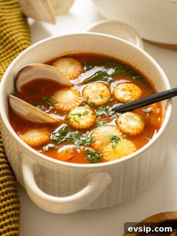 Manhattan clam chowder topped with oyster crackers.