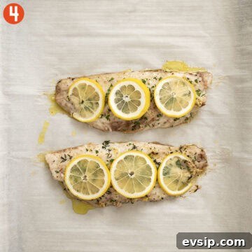 Crispy Baked Red Snapper with Lemon and Herbs 8 Baked red snapper finished on a baking tray.