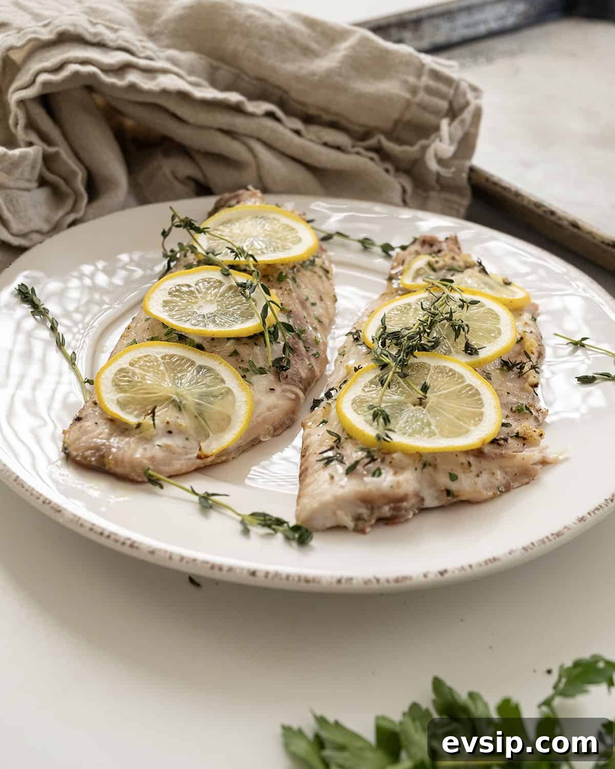 Crispy Baked Red Snapper with Lemon and Herbs 9 Baked red snapper topped with lemon and thyme.