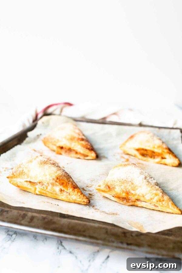 Looking for a sweet pastry dessert? Try these puff pastry apple turnovers. Made with homemade apple pie filling and done in less than 30 minutes.