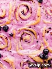 blueberry cinnamon rolls with blueberry cream cheese glaze