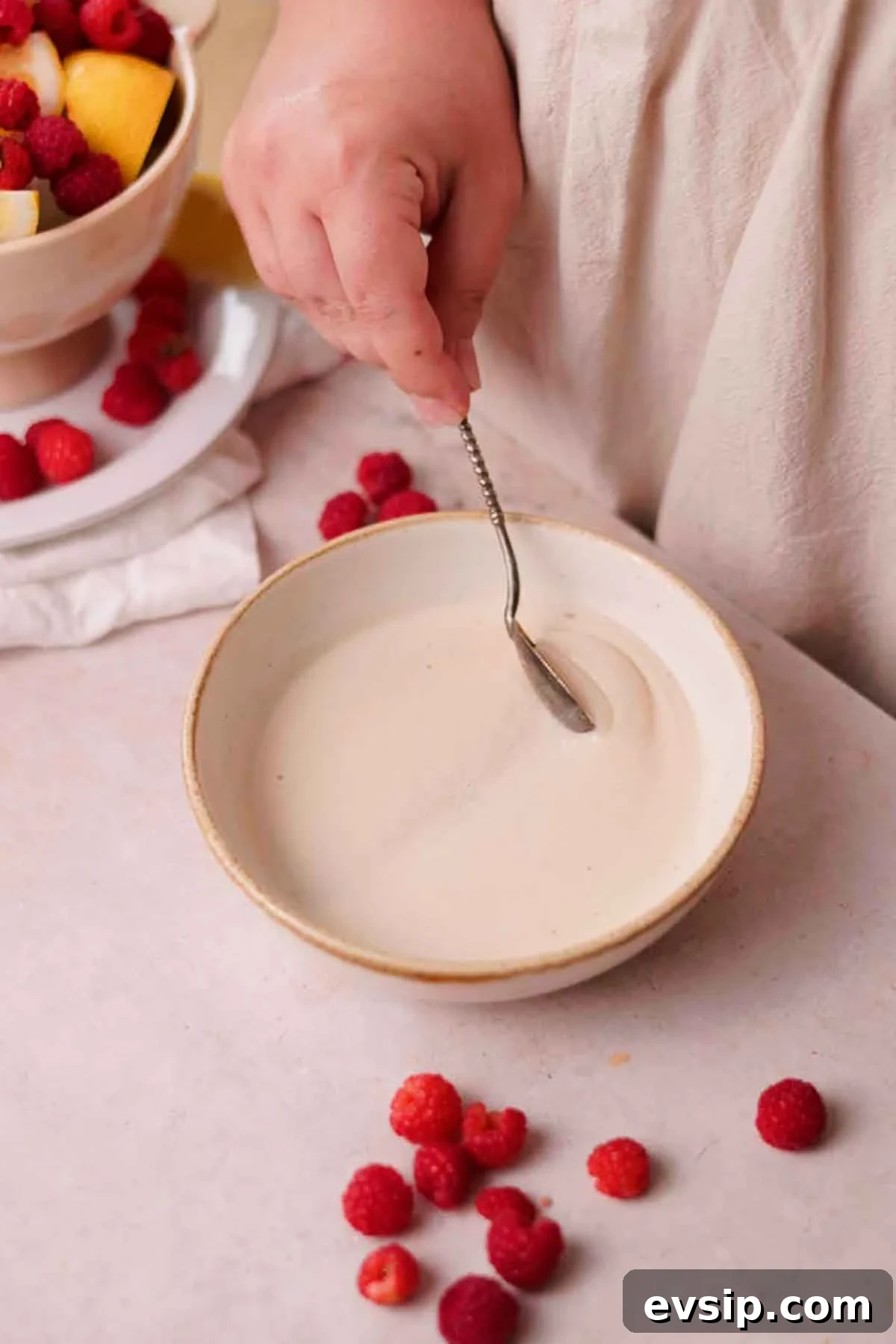 Gooey Raspberry Rolls Recipe: Soft, Homemade Pastry 5 bloomed yeast with thick foam on top in a bowl