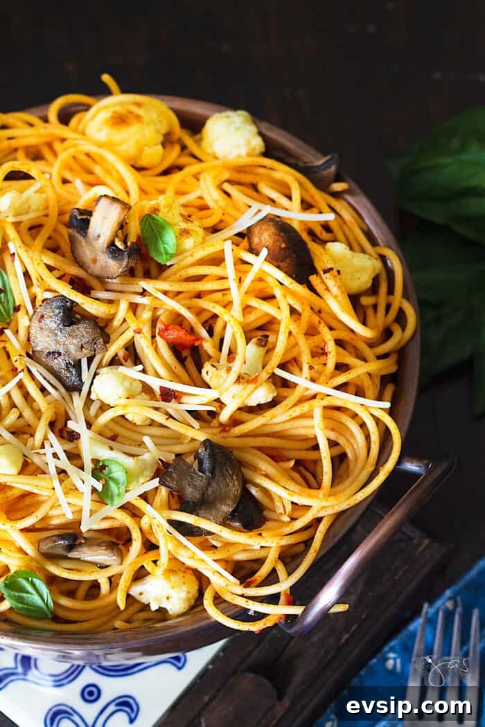 Caramelized Cauliflower & Mushroom Spaghetti Recipe for Dinner 4 An overhead shot of the bowl with spaghetti, cauliflower and mushrooms