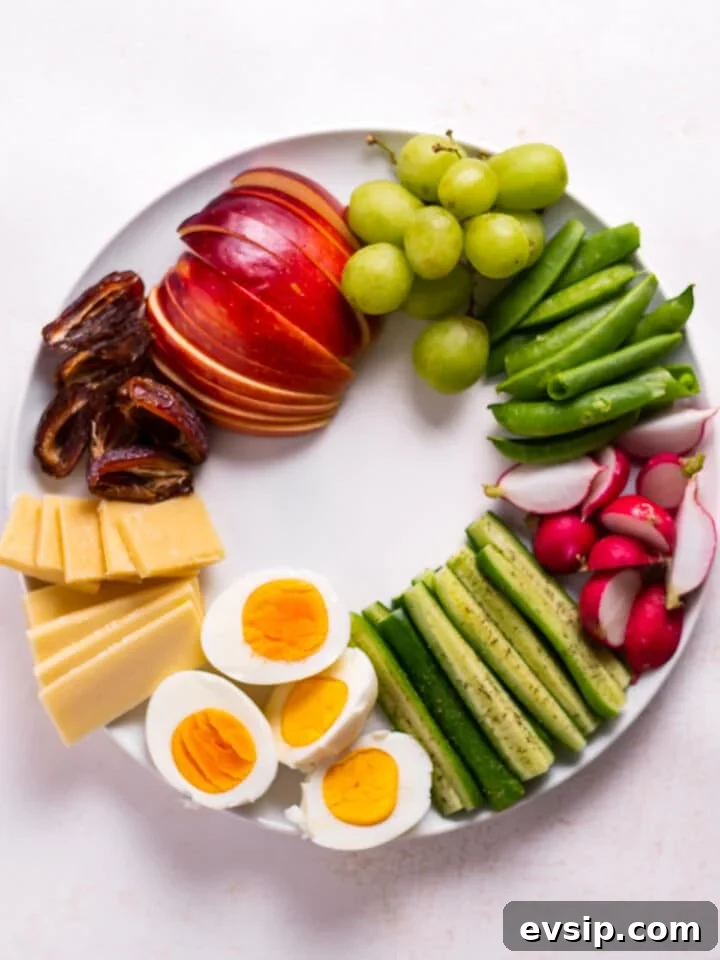 sliced cheese and boiled eggs added to snack plates
