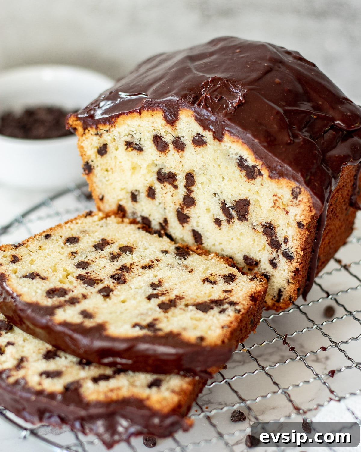 chocolate chip pound cake loaf sliced on a tray