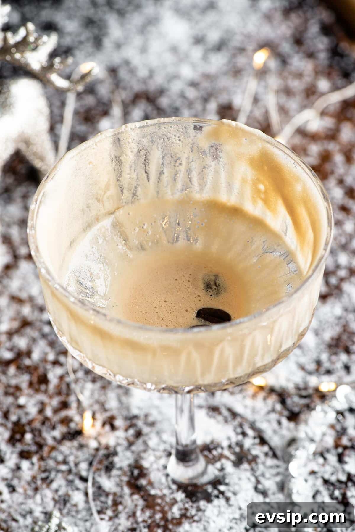 A close up of an empty martini macchiato cocktail