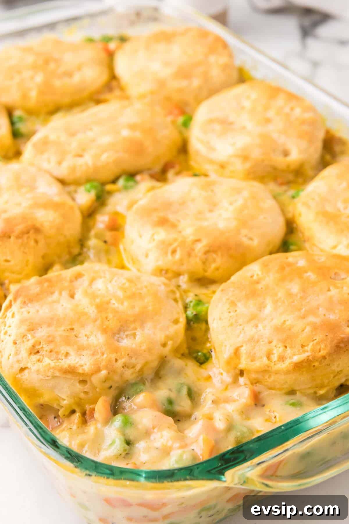Chicken pot pie casserole with biscuits