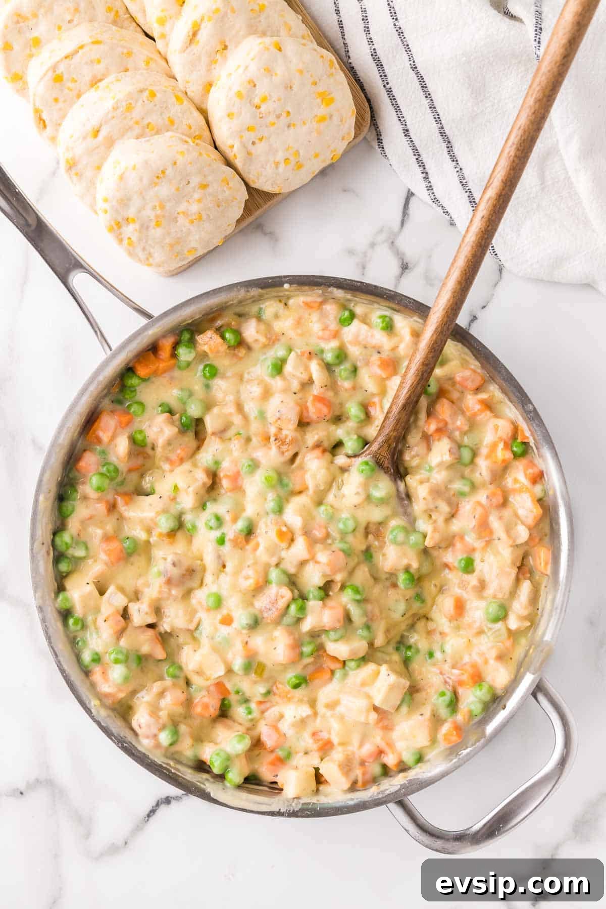 Chicken pot pie filling mixed in a large skillet