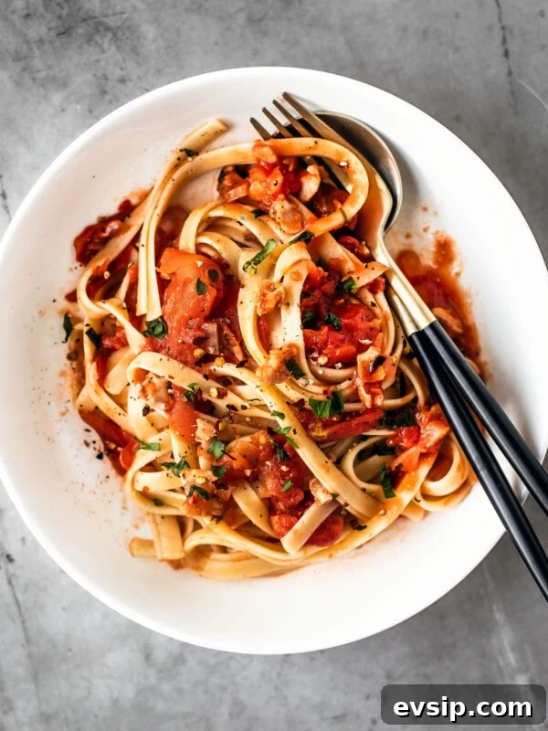Lemon Shrimp Pasta al Limone — Creamy Citrus Pasta Recipe 11 White bowl of clam pasta.