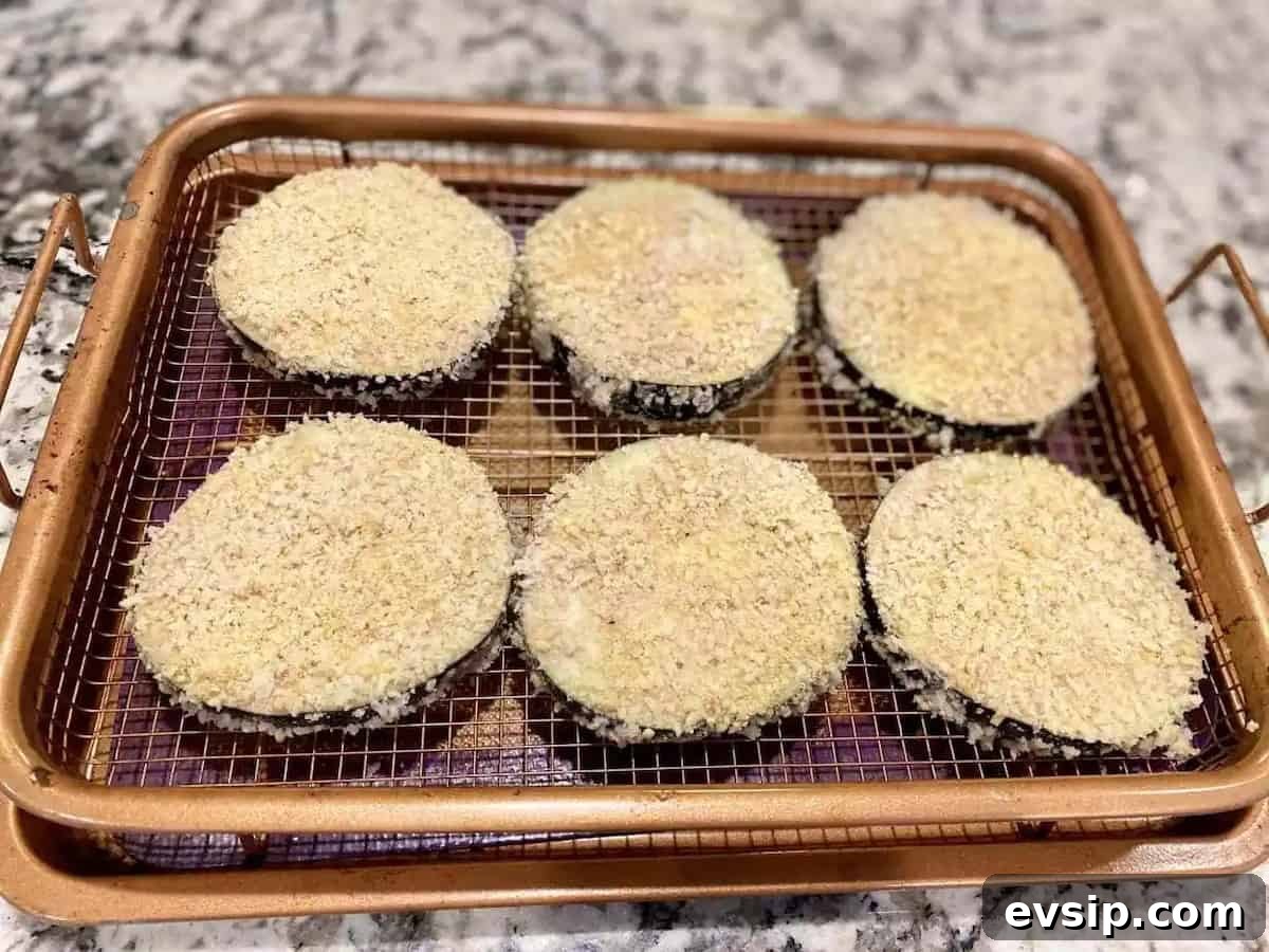 I breaded eggplant slices and placed them on a copper crispy pan.