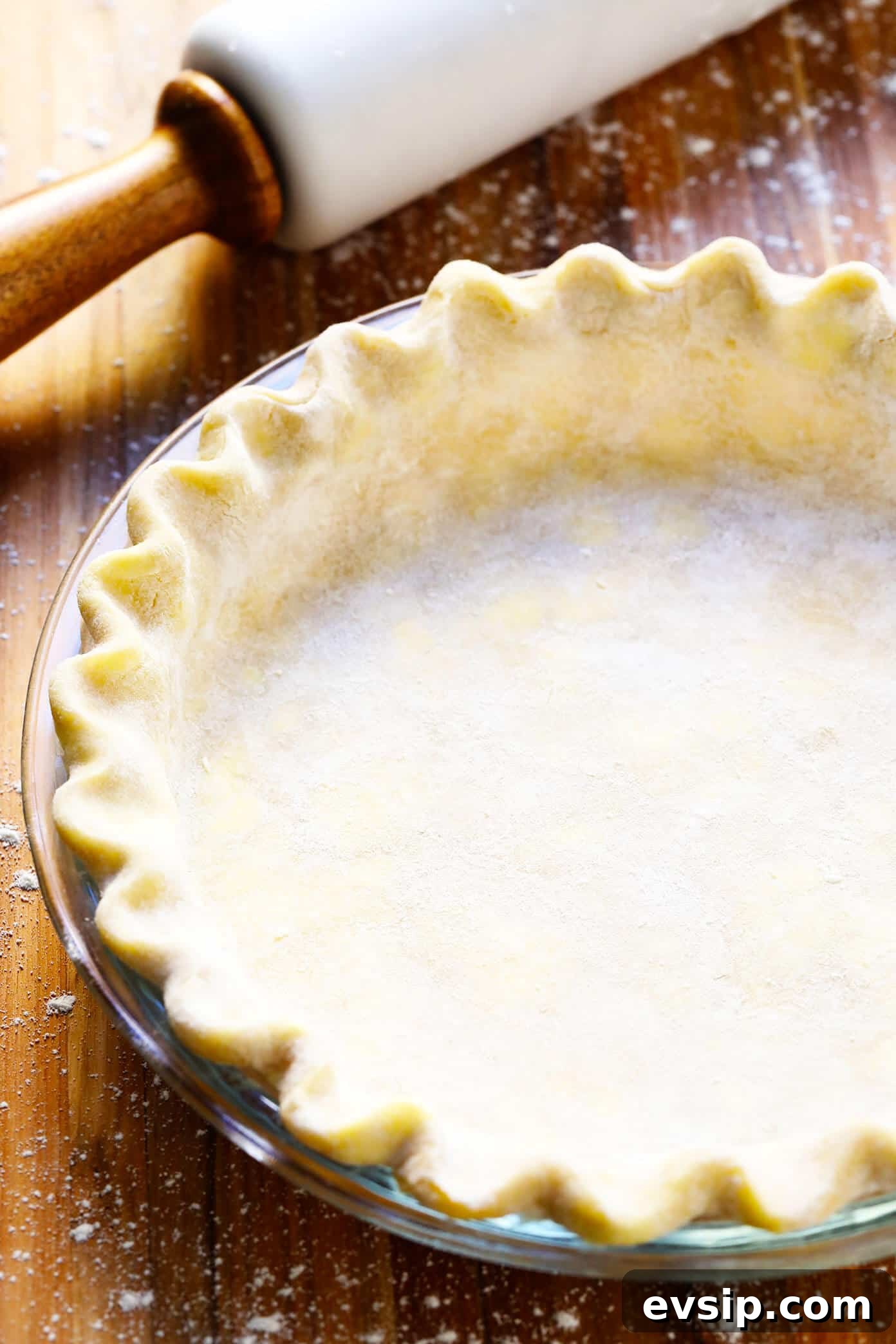 Learn how to make pie crust with this delicious, flaky, all-butter homemade pie crust recipe. It's easy to make in the food processor or 100% by hand with just 5 ingredients. Homemade Pie Crust