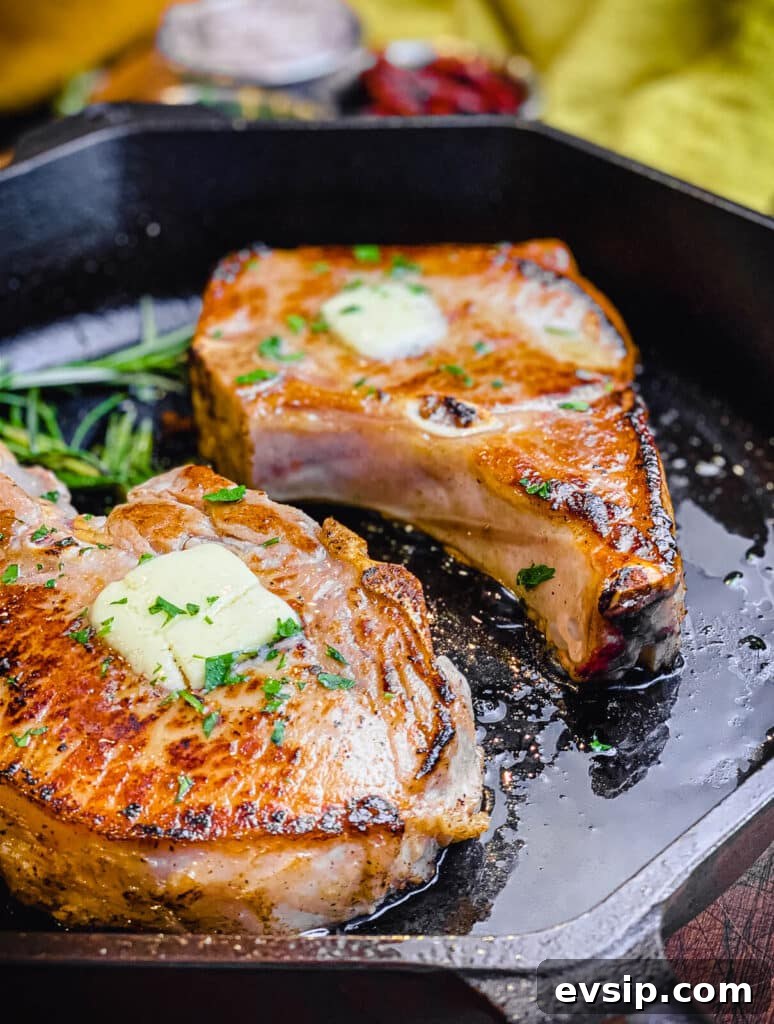 Pan-Seared Pork Chops with Rustic Sun-Dried Tomato Sauce 3 pork chops searing in avocado oil