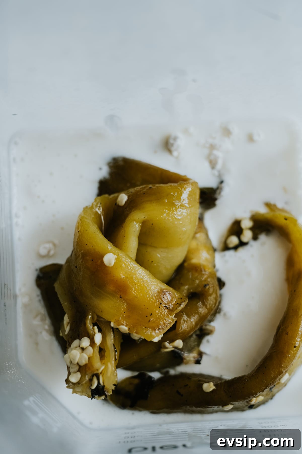 Authentic Green Enchiladas (Enchiladas Verdes) Recipe for Dinner 7 Ingredients for authentic enchiladas verdes sauce—including roasted green chiles, suero, and flour—added to the base of a blender, ready to be blended into a creamy green enchilada sauce.