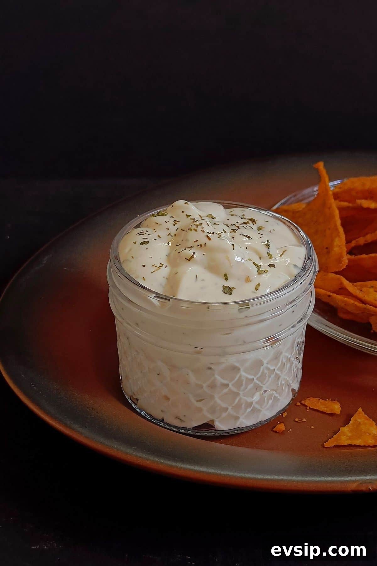 Creamy Wingstop ranch in a glass jar.