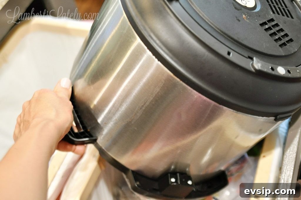 dumping instant pot debris into the trash.