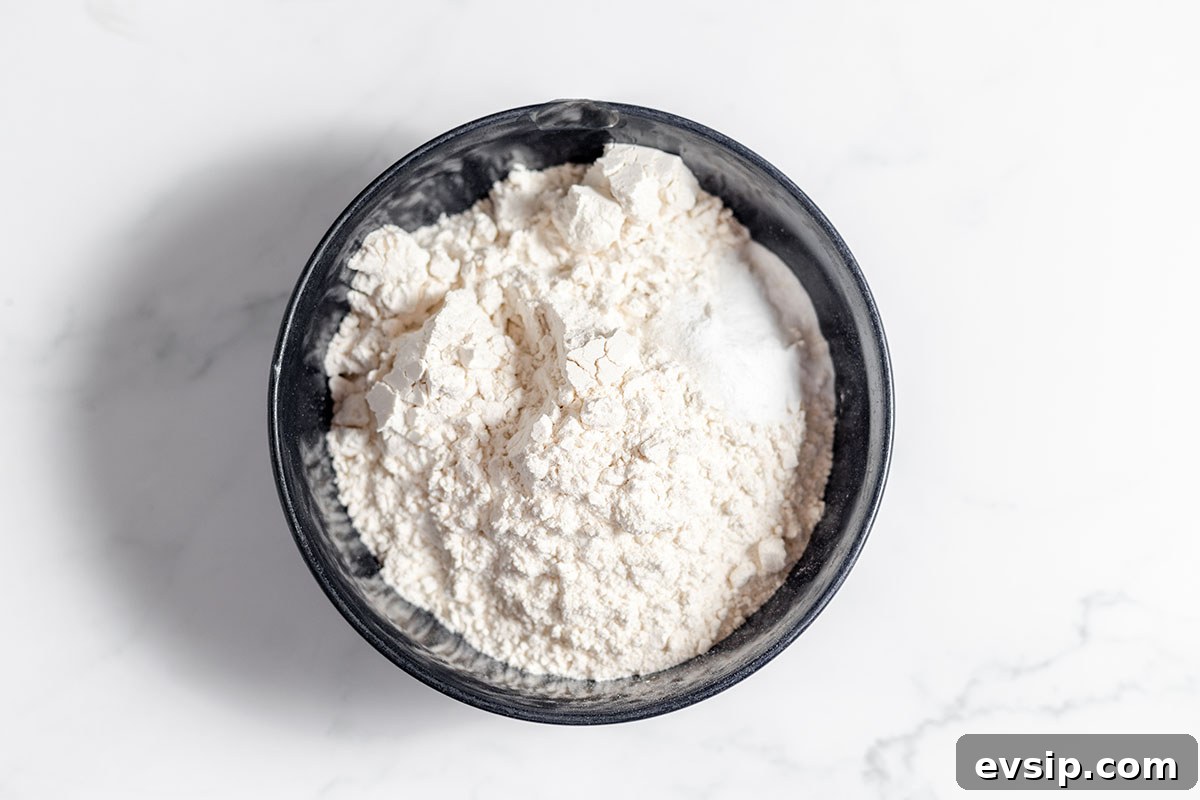 Flour baking soda and salt in a bowl.