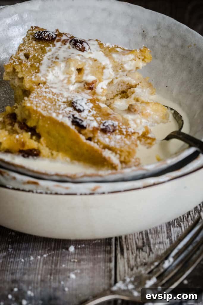 Gluten-Free Bread and Butter Pudding Recipe — Cozy Dessert Guide 11 bowl of bread and butter pudding with cream