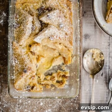 Gluten-Free Bread and Butter Pudding Recipe — Cozy Dessert Guide 13 bread and butter pudding in a serving dish with a portion removed