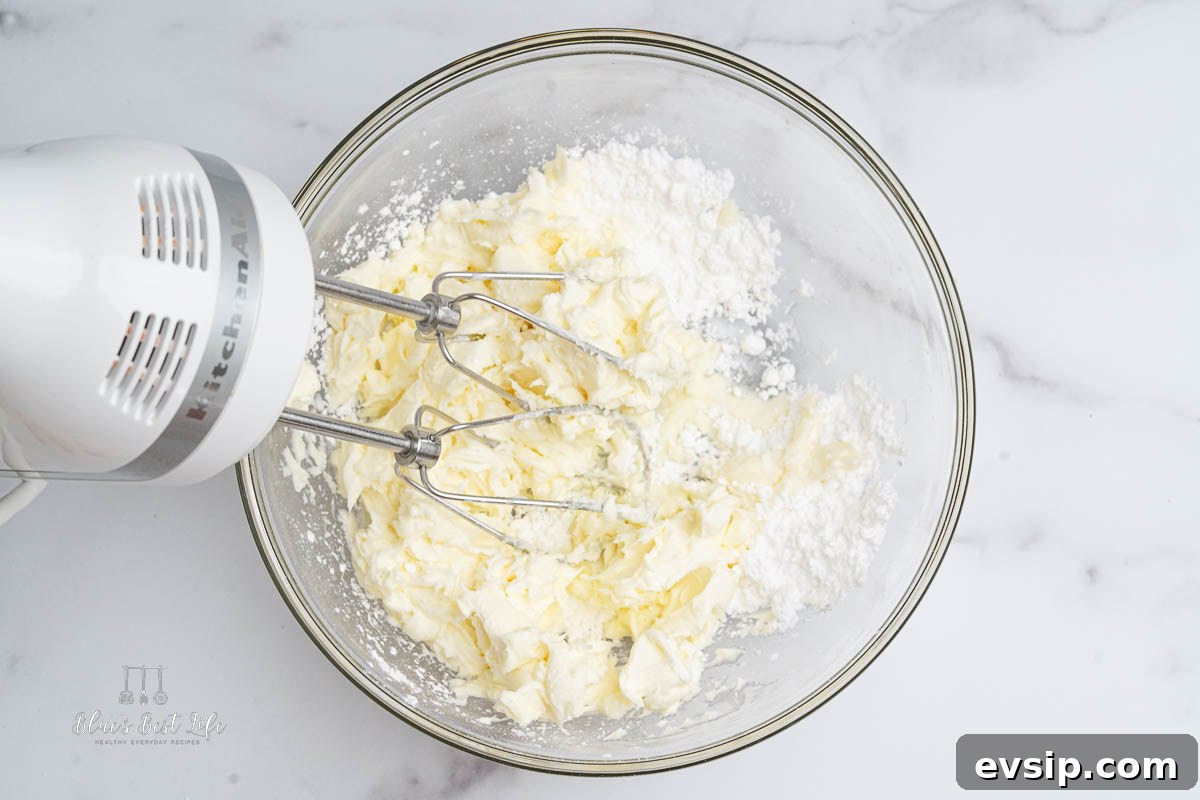 Individual Egg-Free Tiramisu Cups: Creamy No-Bake Dessert 4 mixing together mascarpone, cream and sugar