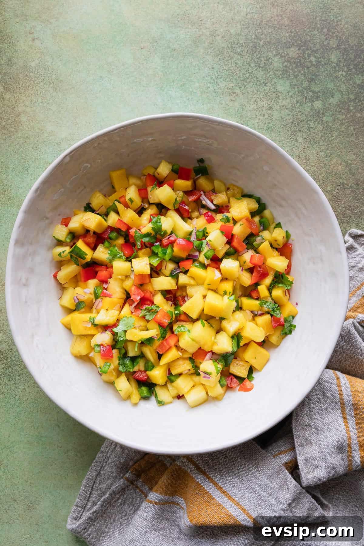 Mango Pineapple Salsa Recipe: Fresh Tropical Salsa for Chips & Fish 5 Making the recipe.