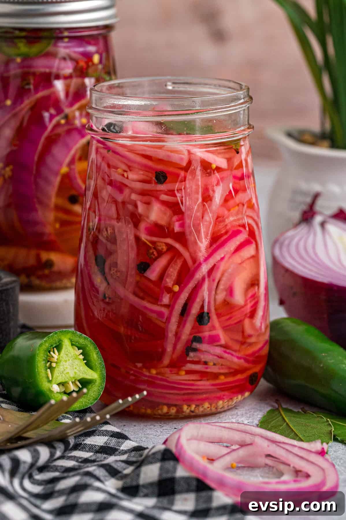 A jar of quick pickled red onions