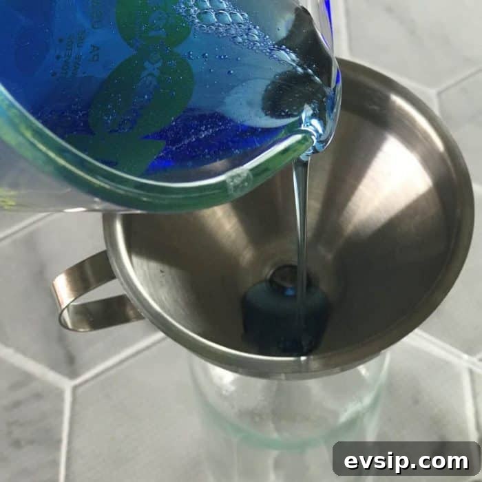 Add dish soap to bottle