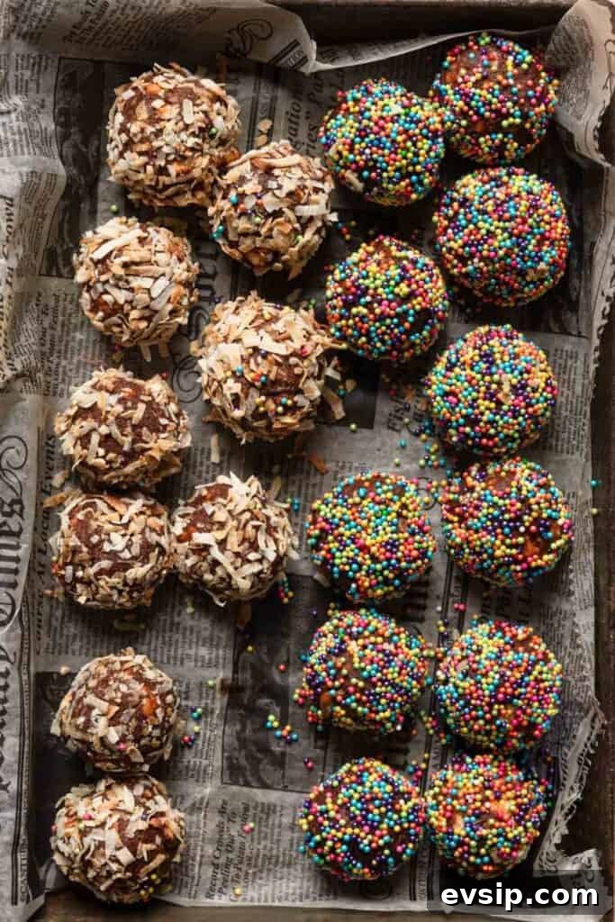 Israeli Chocolate Truffles Recipe — Classic No-Bake Treat 10 A baking pan with Israeli chocolate balls cookies coated with sprinkles and shredded coconut.