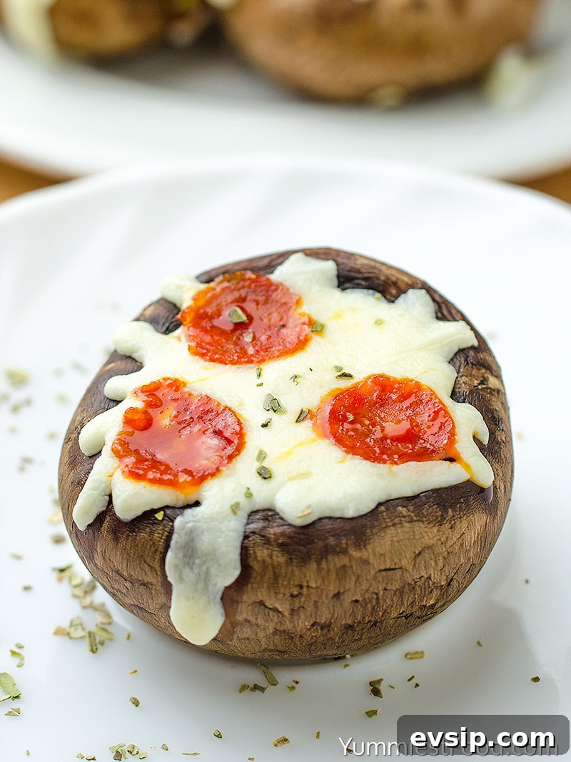 Pizza-Stuffed Mushrooms: Cheesy Mini Pizza Bites Recipe 5 Pizza Stuffed Mushroom - served on the plate