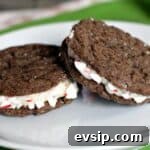 Peppermint Chocolate Sandwich Cookies Recipe – Festive Mint Cookies 11 chocolate peppermint cookies on plate