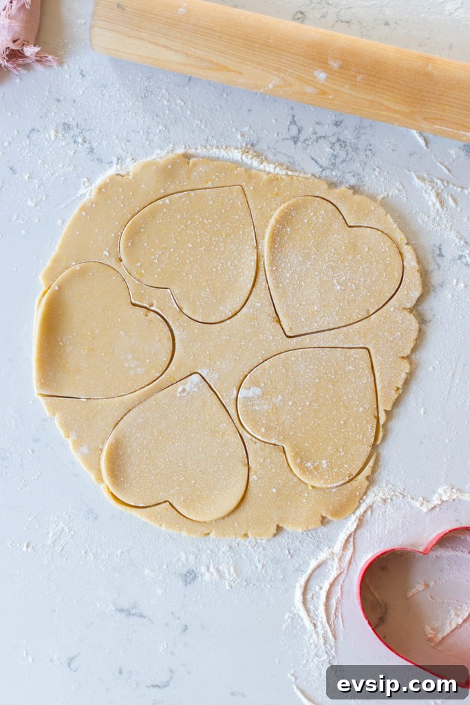 Cutting Strawberry Lemon Heart Cookies