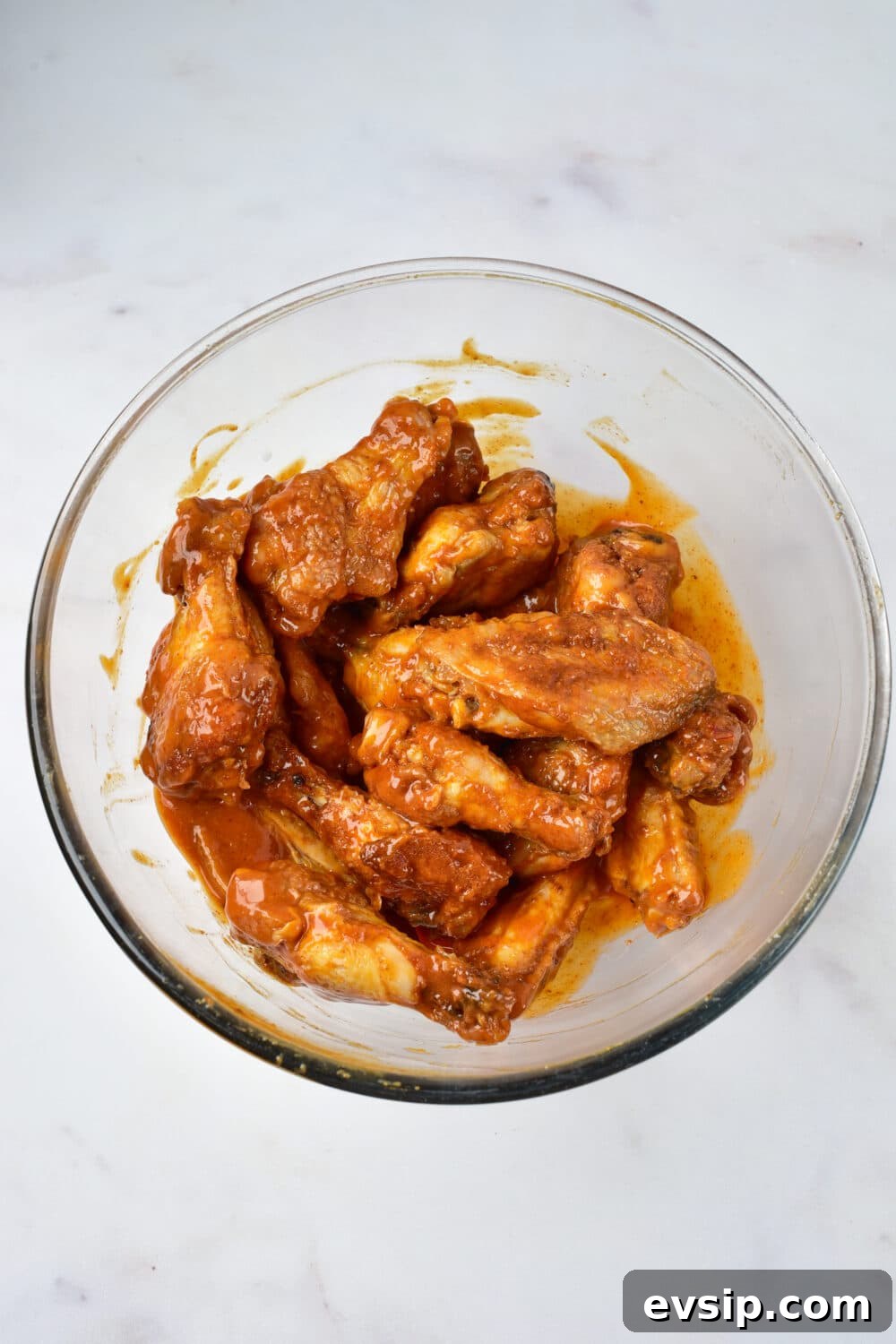 baked buffalo wings tossed in homemade buffalo sauce
