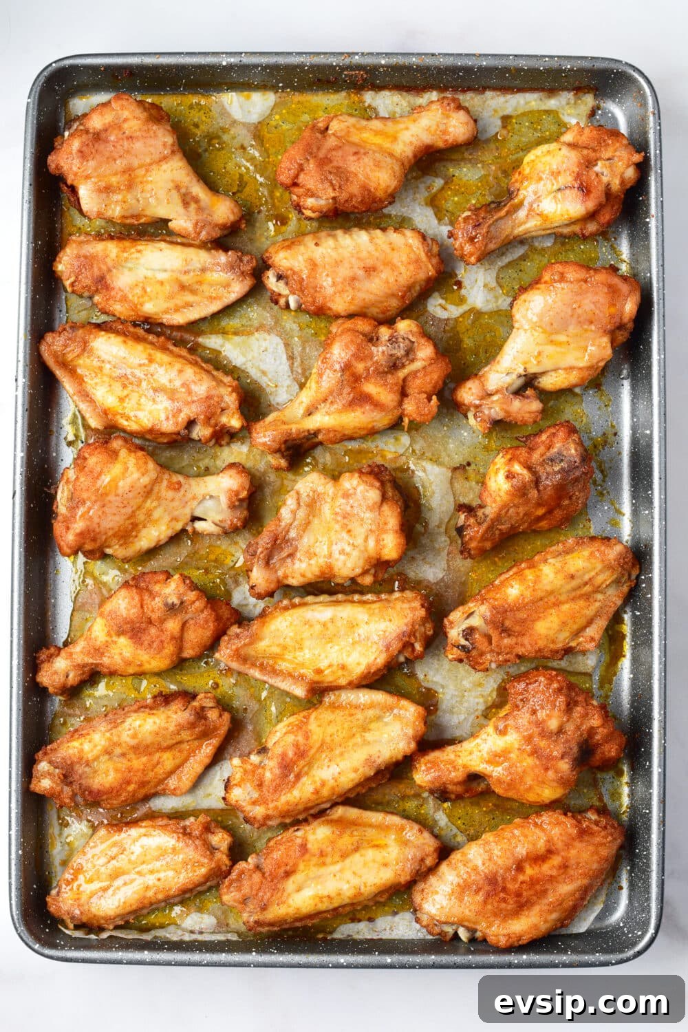 chicken wings ready to be flipped