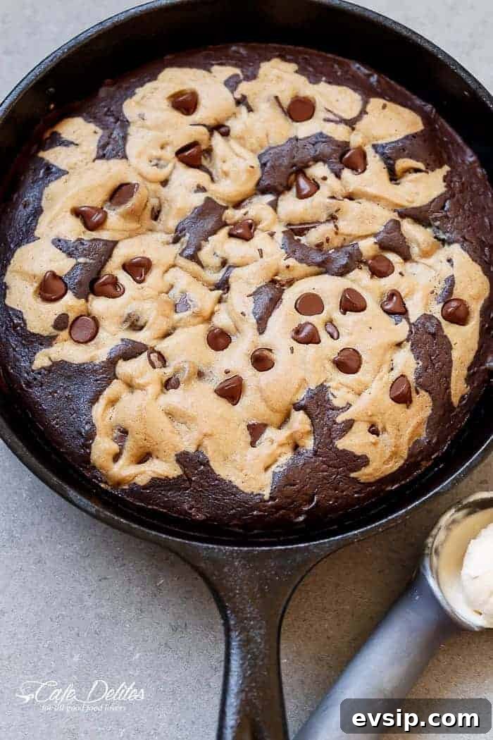 Chewy Chocolate Chip Brookie Recipe: Brownie-Cookie Mashup 12 Top view image of Chocolate Chip Cookie Marbled Skillet Brownie is crispy on the outside. Extreme fudgy-ness going on on the inside.