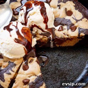 Chewy Chocolate Chip Brookie Recipe: Brownie-Cookie Mashup 13 A piece removed from Chocolate Chip Cookie Marbled Skillet Brownie