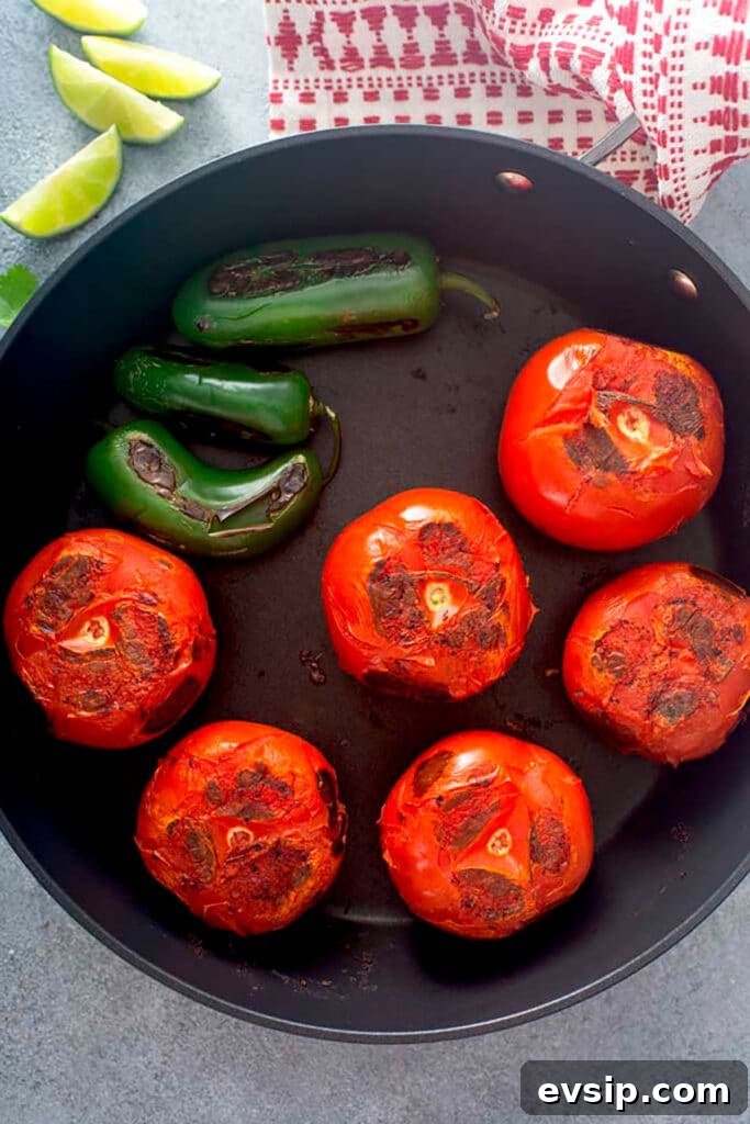 Chared Tomatoes and Chiles on a large cast iron skillet