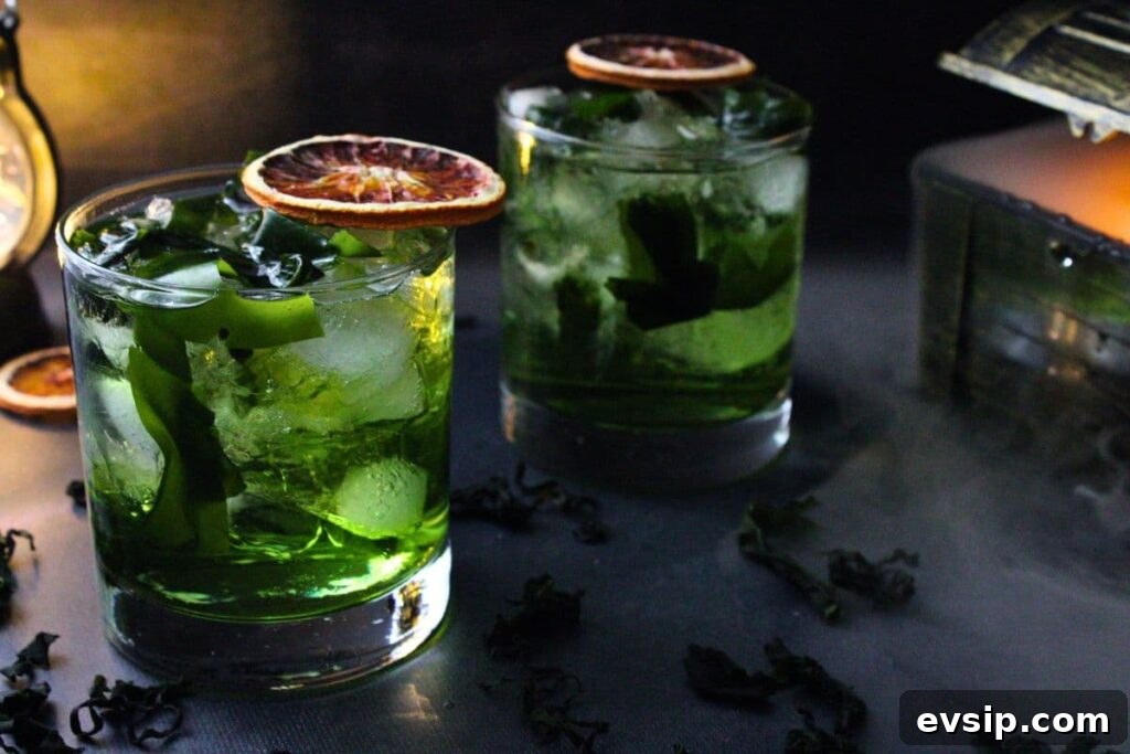 two flying dutchman cocktails next to an open pirate chest with smoke pouring out