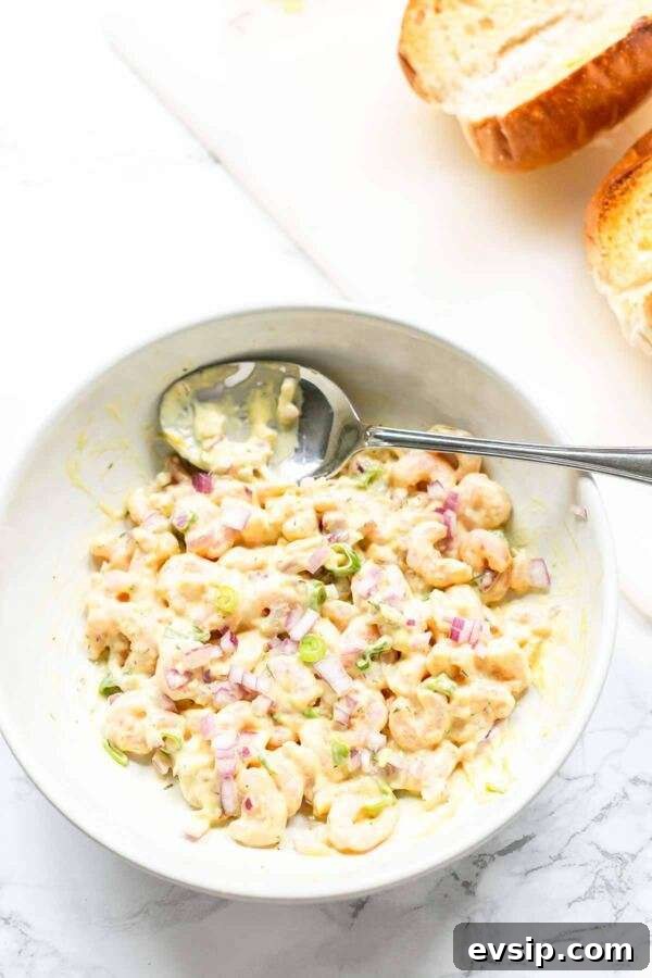 A toasted bun with creamy shrimp salad makes a simple but satisfying sandwich.
