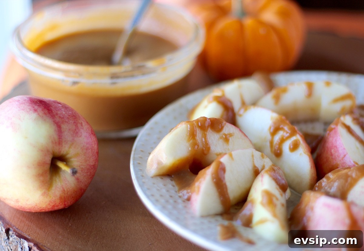 Pumpkin Salted Caramel Sauce- A Paleo, dairy-free sea salt caramel sauce featuring Fall flavors from pumpkin, cinnamon, and ginger! SO GOOD! | fedandfulfilled.com
